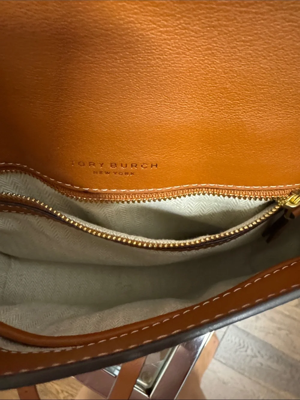 Tory Burch Cognac Leather Logo Tassel Crossbody in excellent condition.